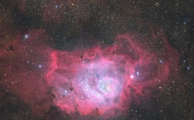 M8, the Lagoon Nebula: A Cosmic Cradle of Star Formation